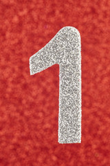 Number one silver color over a red background. Anniversary.