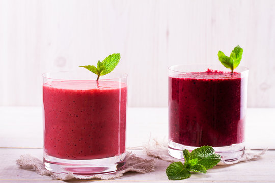 Summer berries smoothie garnished with mint
