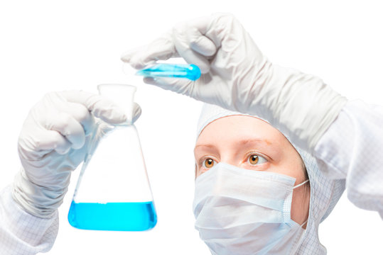woman experienced chemist examines radioactive substances in the laboratory