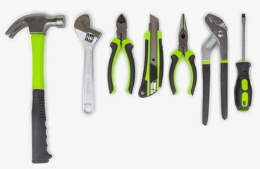 Set of green tools isolated on white background