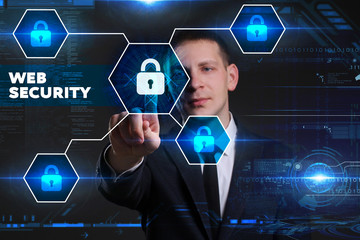 Business, Technology, Internet and network concept. Young businessman working on a virtual blackboard of the future, he sees the inscription: web security
