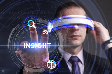 Business, Technology, Internet and network concept. Young businessman working in virtual reality glasses sees the inscription: Insight