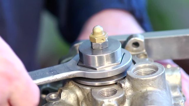 Engine assembly with wrench