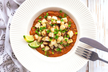 Stewed kohlrabi cabbage with lime and tomato sause