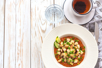 Stewed kohlrabi cabbage with lime and tomato sause