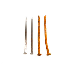 old rusty and new nails isolated