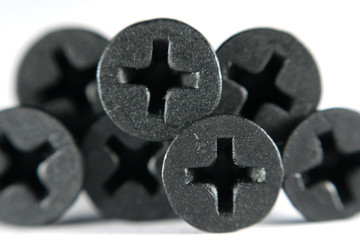 Black screws close up.