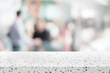 Stone table top and blurred restaurant interior background with vintage filter - can used for display or montage your products.