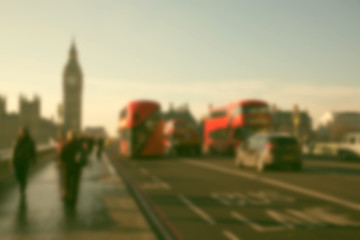 blurred background of traffic on Westminster Bridge with typical English cabs and buses, London