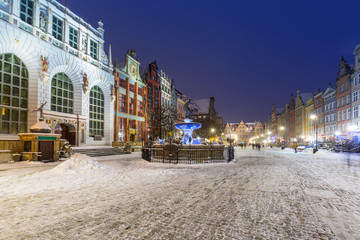 Long lane in the old town of Gdansk in snowy winter, Poland