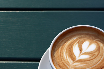 Coffee cup with a barista flower 3