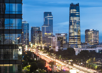Highway in Jakarta business district at night in Indonesia