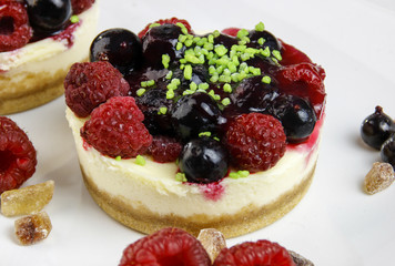 mini cheesecakes with mixed berries
