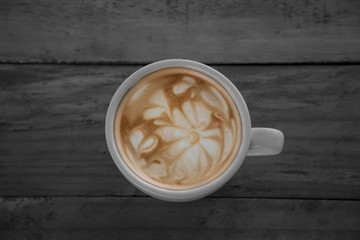 Coffee cup on woodden table