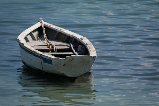 White pirogue - wooden boat at sea - Mauritius