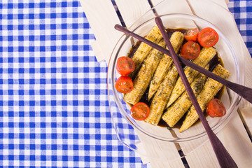 Baby corn with soy marinade of soy sauce, rosemary, olive oil and garlic