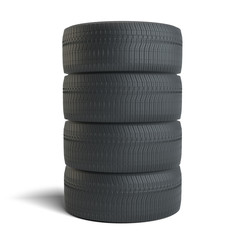 Stack of four black tires