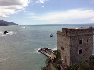 Beautiful landscape view of castle, sea and sky in Monterosso, Italy.