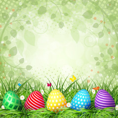 Golden Easter eggs on the grass