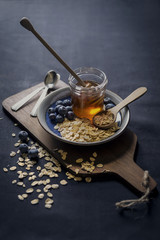 Fototapeta premium Blueberries, oats and honey