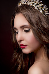 Fototapeta premium Beautiful girl with a tiara on her head