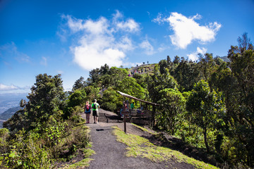 Tourists walk on volcans regia near Antigua, Guatemala.