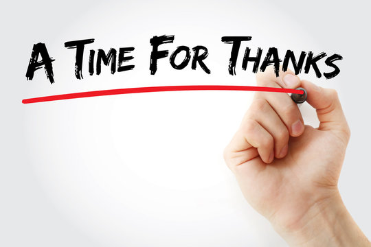 Hand writing A Time For Thanks with marker, concept background