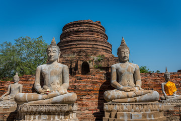 Fototapeta premium Wat Yai Chai Mongkol in Ayutthaya Historical Park . Highlight of the monastery is its very large imposing prang dominating the area. Wat Yai Chai Mongkhon, Ayutthaya, Thailand