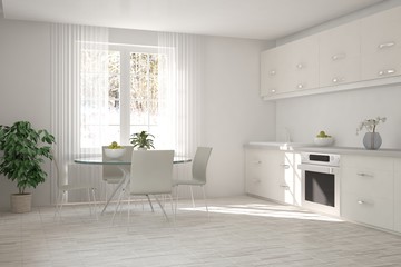 White kitchen with winter landscape in window. Scandinavian interior design