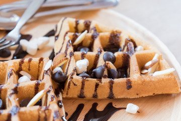 delicious sweet dessert : homemade waffle with chocolate sauce