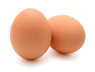 Obraz na płótnie Canvas Organic brown eggs isolated on white background