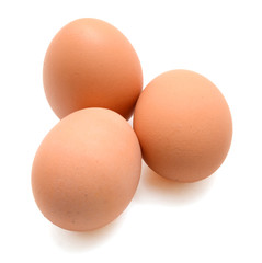 Organic brown eggs isolated on white background