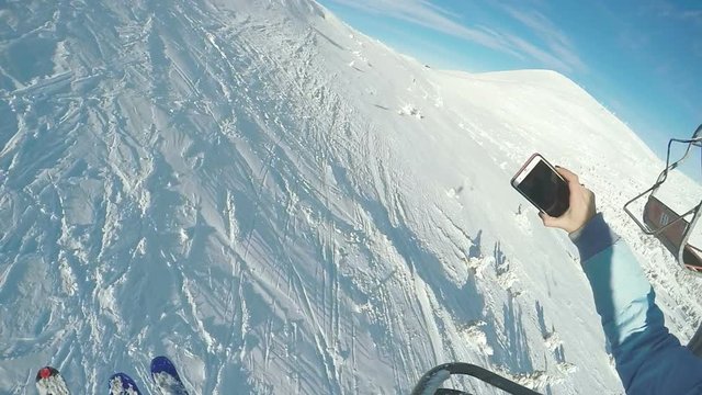 Shooting smartphone on the ski lift