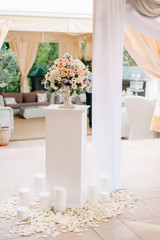 Arch for the wedding ceremony, with ancient column nearby