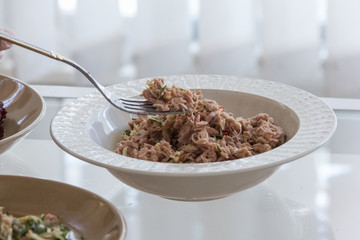fork take fresh tuna mixed