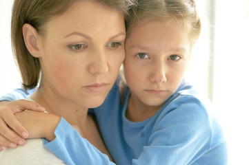 upset mother and daughter