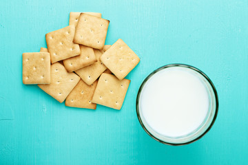 healthy breakfast glass of milk and crackers, close up, top view