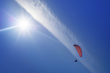 Air paragliding under the Sun