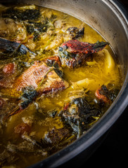 Fish soup in steel plate, typical Croatian food