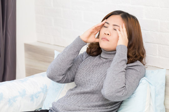 Asian Woman With Headache, Migraine And Dizziness