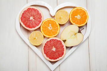 Fruit in a heart on  white background