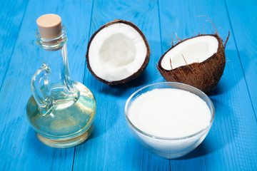 Coconut oil on a blue wooden background