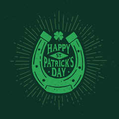 St. Patrick's Day. Retro style emblem of horseshoe. Typography. Vector illustration.