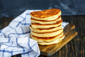Tasty Pancake and kitchen towel.