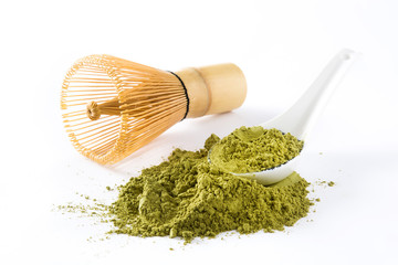 Matcha Green Tea and spoon isolated on white background
