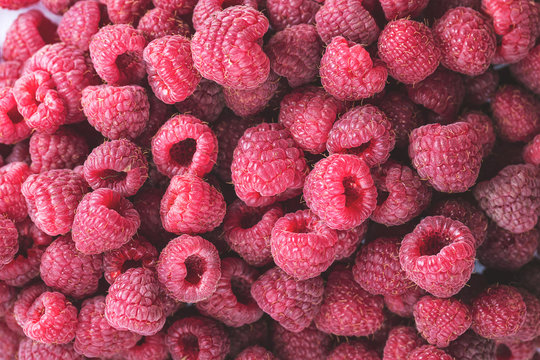 Sweet red raspberries background