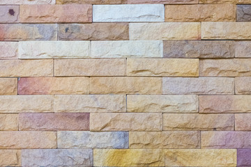 Multicolor of Stone ceramic Brick wall beautiful color texture background for art interiors design in home, house, building, shop, store, art store, coffee shop