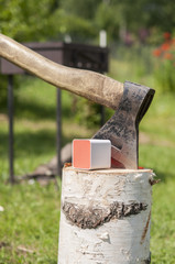 Red wireless bluetooth speaker on nature.