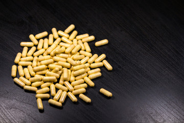pills/drug isolated on black background