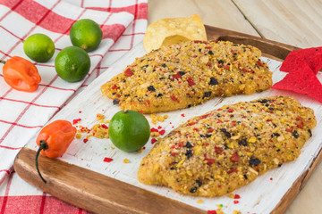 Uncooked tortilla crusted tilapia